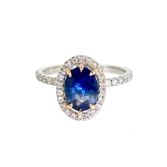 Blue Sapphire & Diamond Halo Ring in Platinum