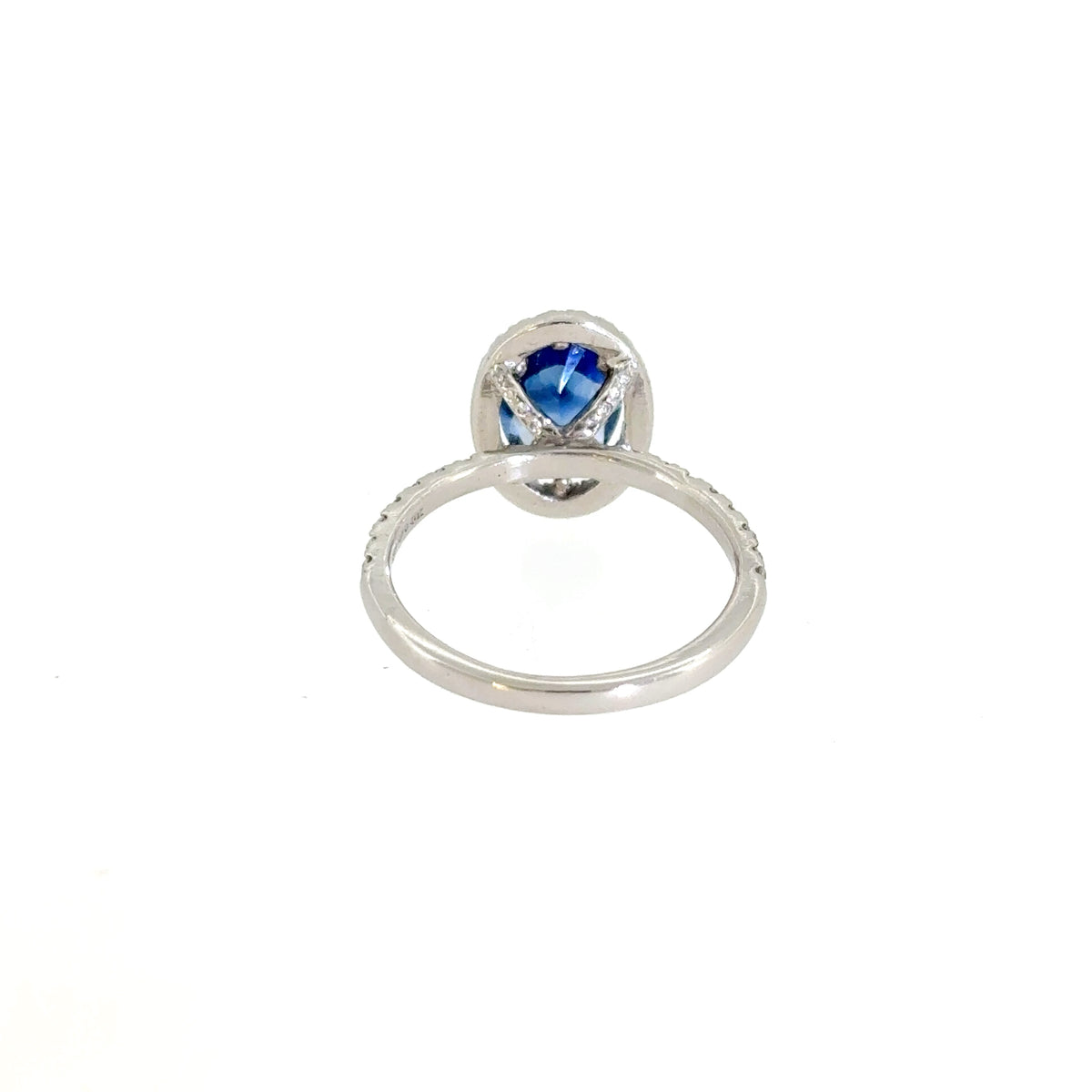 Blue Sapphire & Diamond Halo Ring in Platinum