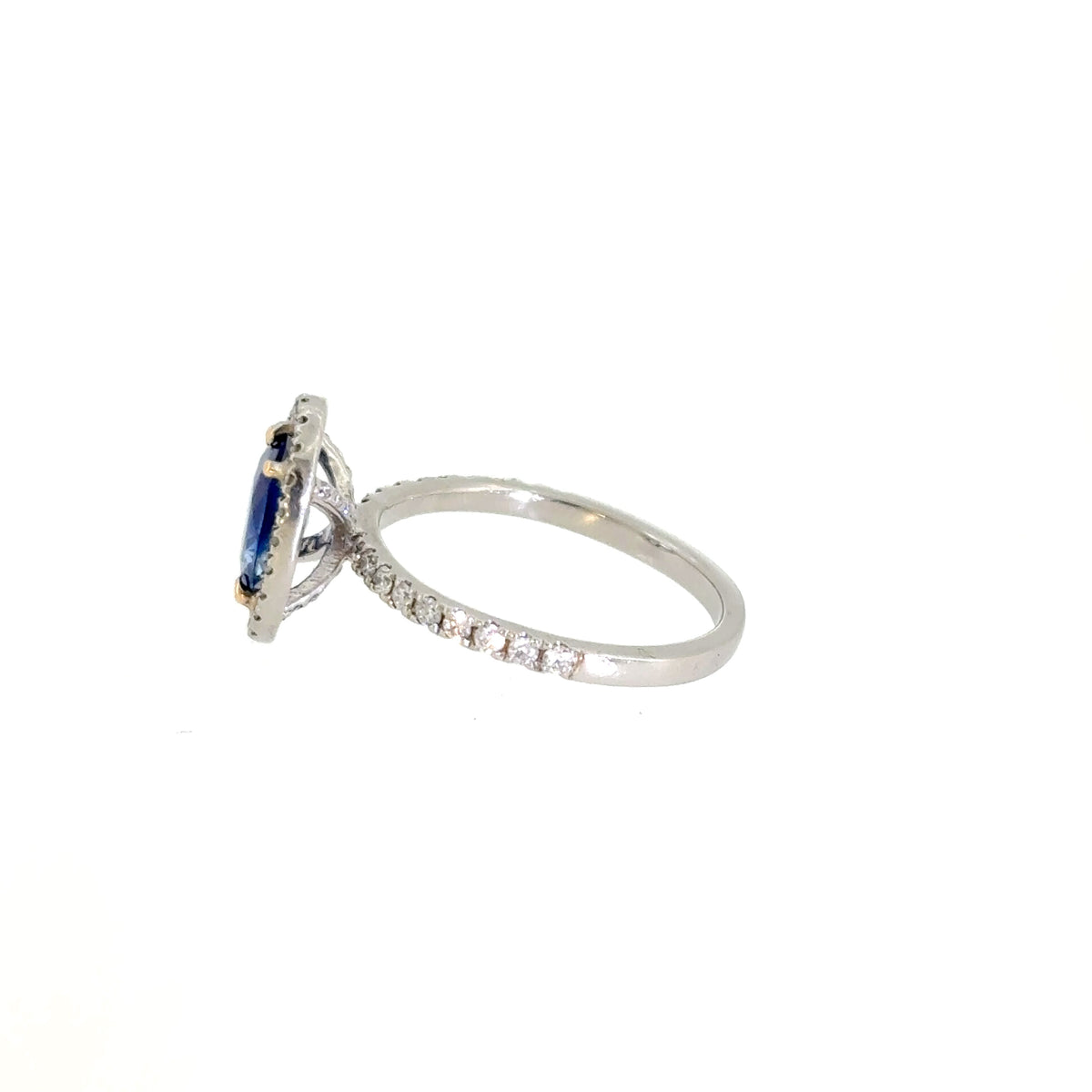 Blue Sapphire & Diamond Halo Ring in Platinum