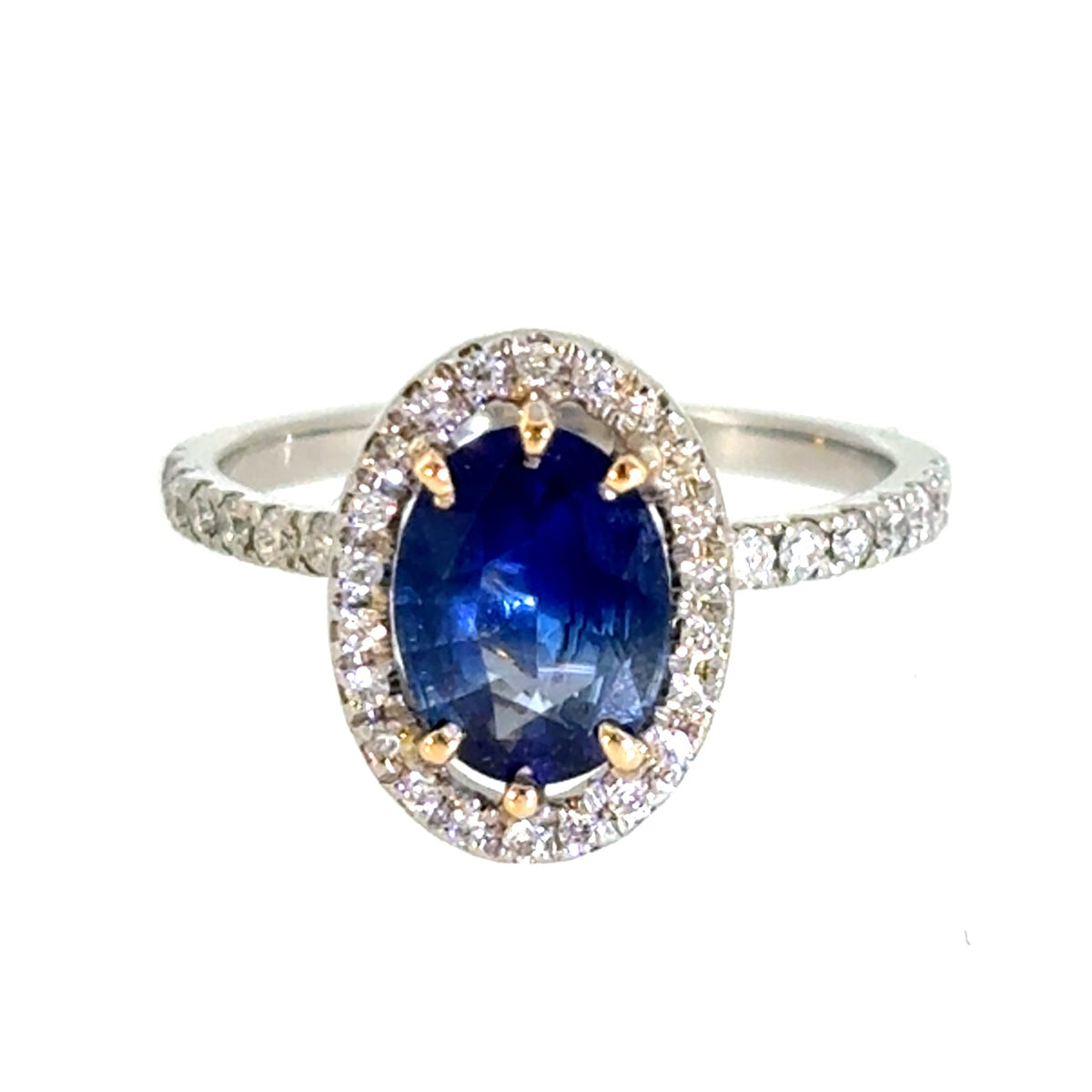 Blue Sapphire & Diamond Halo Ring in Platinum